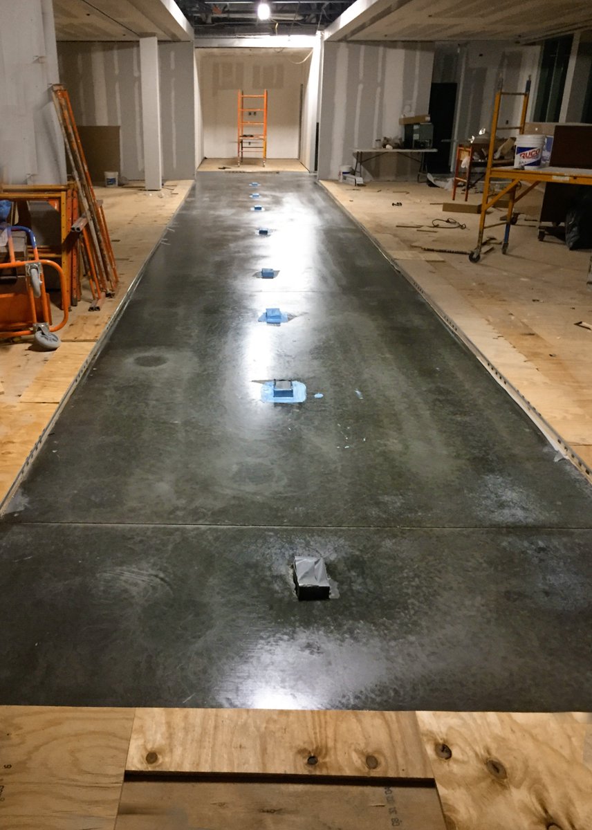 Design Within Reach's concrete flooring is now primed and prepped with a decorative concrete base coat! #dwr #construction #newfloors