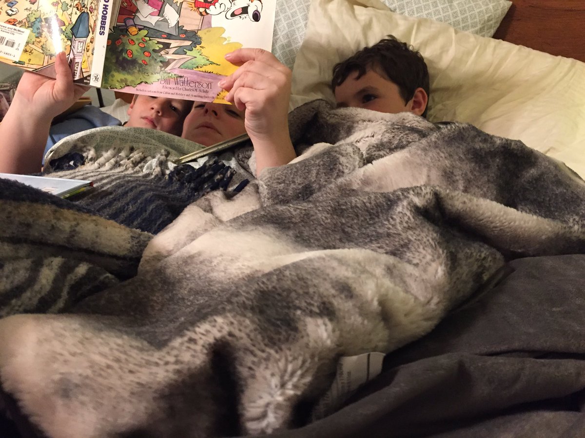 Kathyjeanwalker's tweet photo. Celebrating World Read Aloud Day with my littles' favorite bed time reading #CalvinandHobbes #wrad17 #readaloudday https://t.co/nFBzBqrM8h
