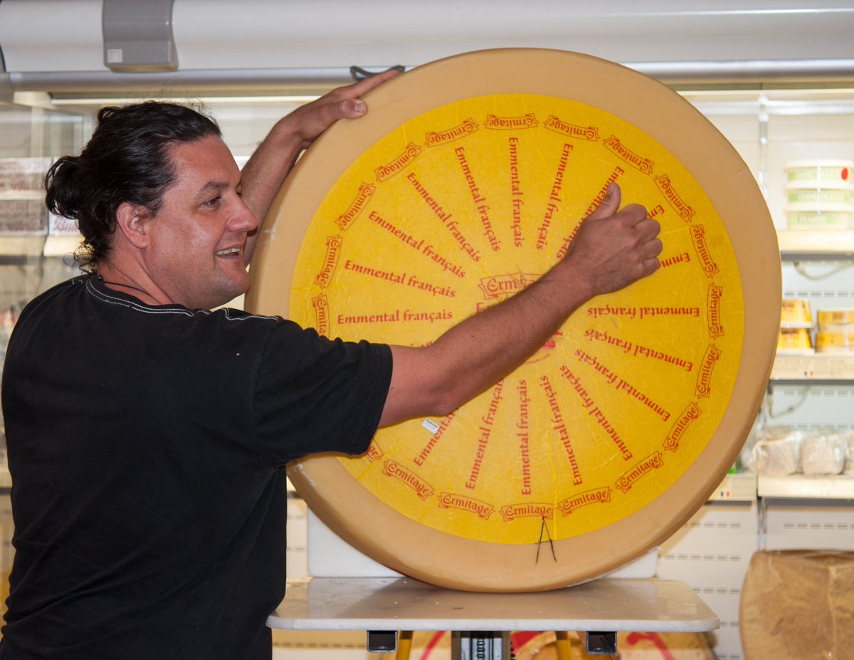 Our cheese monger is getting ready to cut this magnificent 83kg wheel of Emmental! Join us at our Market day next Sunday to watch..
