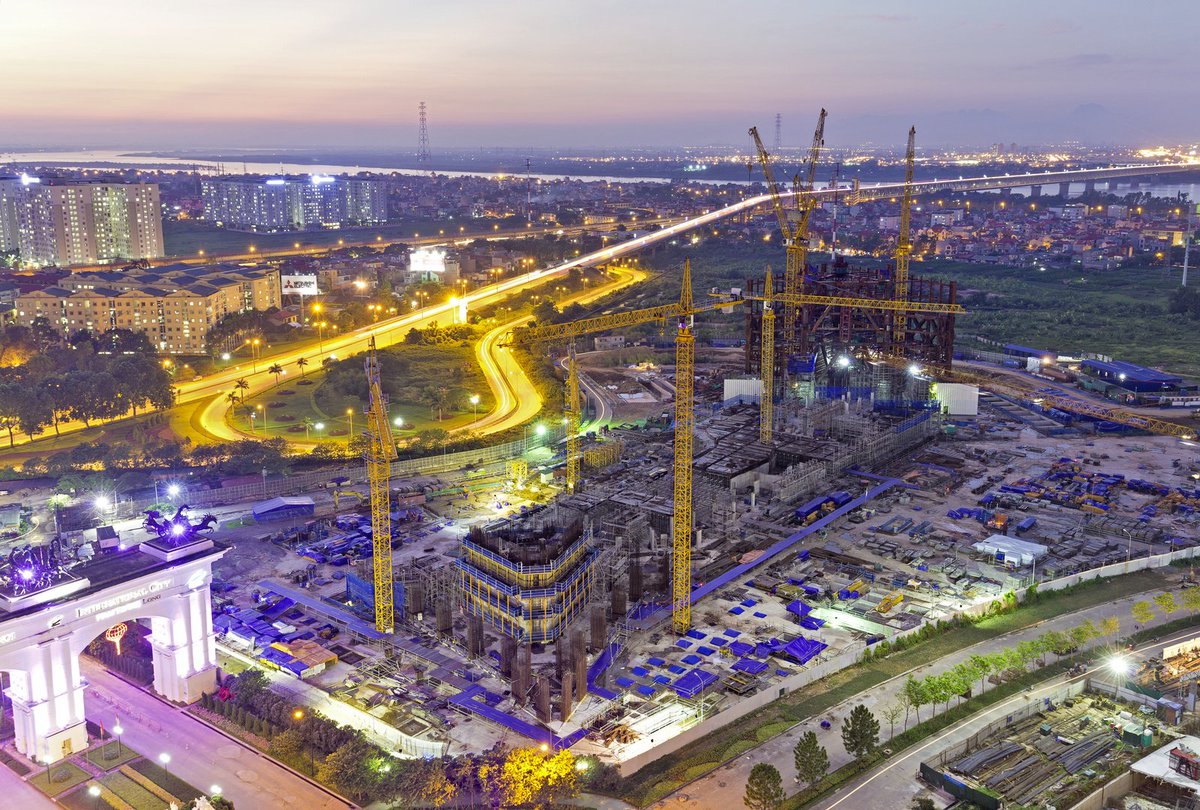 LH_Construction's tweet photo. Vietnam's highest tower: Three 542 HC-L 18/36 Litronic and four 280 EC-H 16 Litronic units have been erected on the site #Liebherr #Crane https://t.co/MXhVgJjkoS