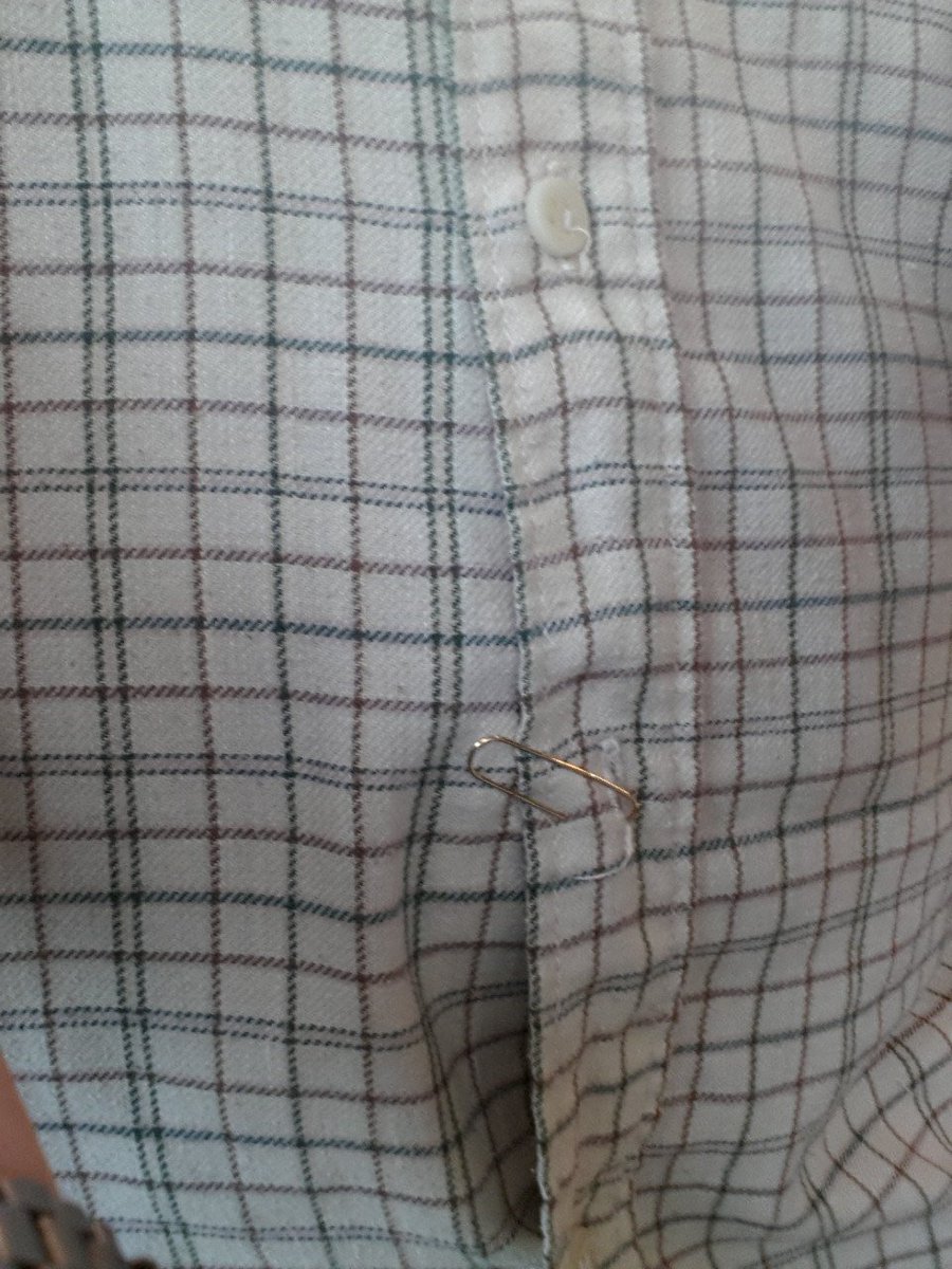 Anarchivy's tweet image. A button fell off my shirt on my way to work, but it&apos;s ok, I fixed it... #Archivesolutions 📎