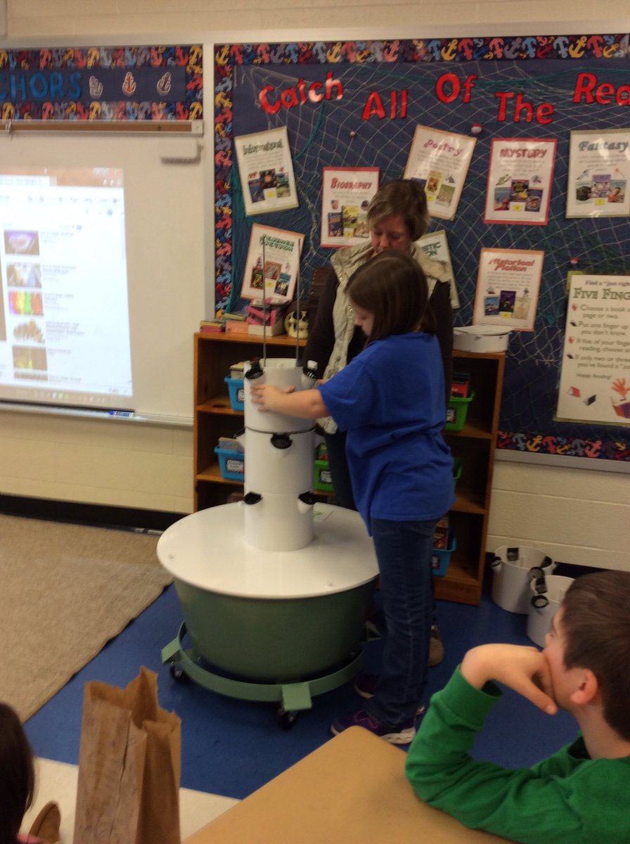 Putting the Tower Garden together.