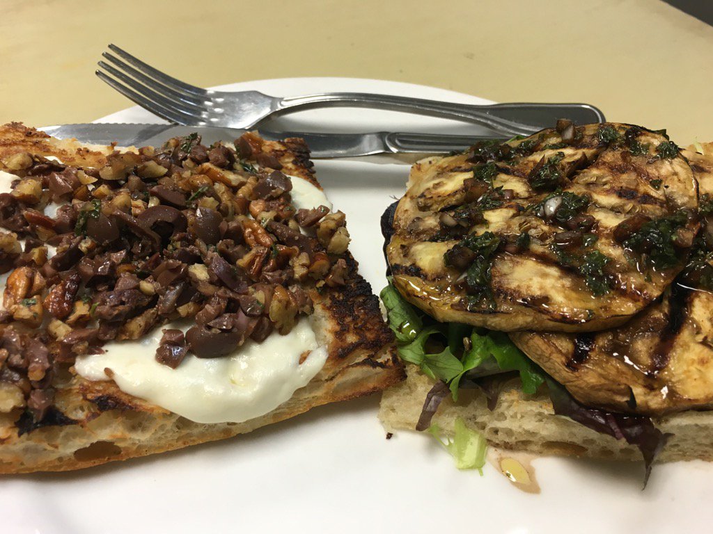 tabellatweets's tweet photo. Open-faced eggplant sandwich with a pecans and kalamata olive mix.   Lunch today! https://t.co/E4RvYcNxKA
