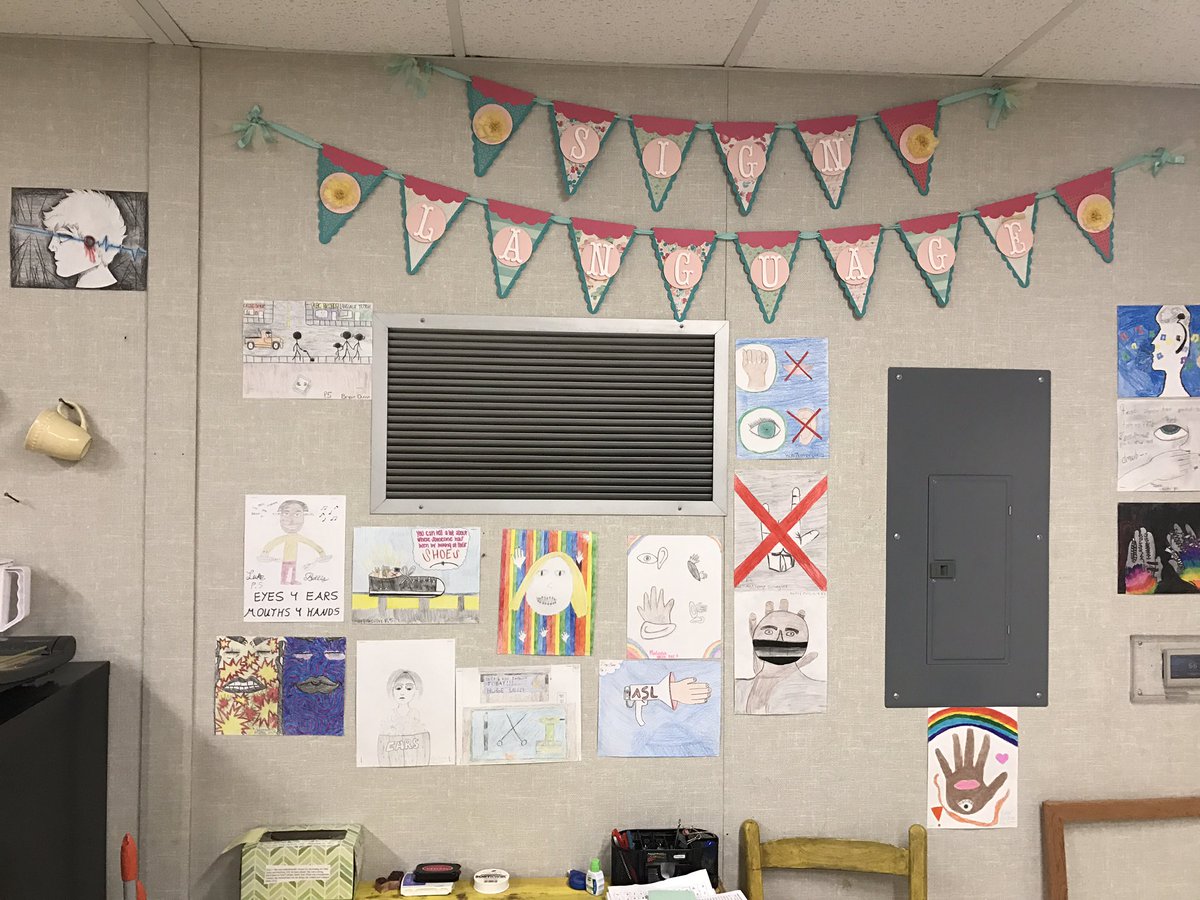 Miss_Higgason's tweet photo. ASL One's artwork for our De'Via unit. Some pieces are expressing Deaf oppression or how Deaf people feel in a hearing world. https://t.co/i0FVmrofca