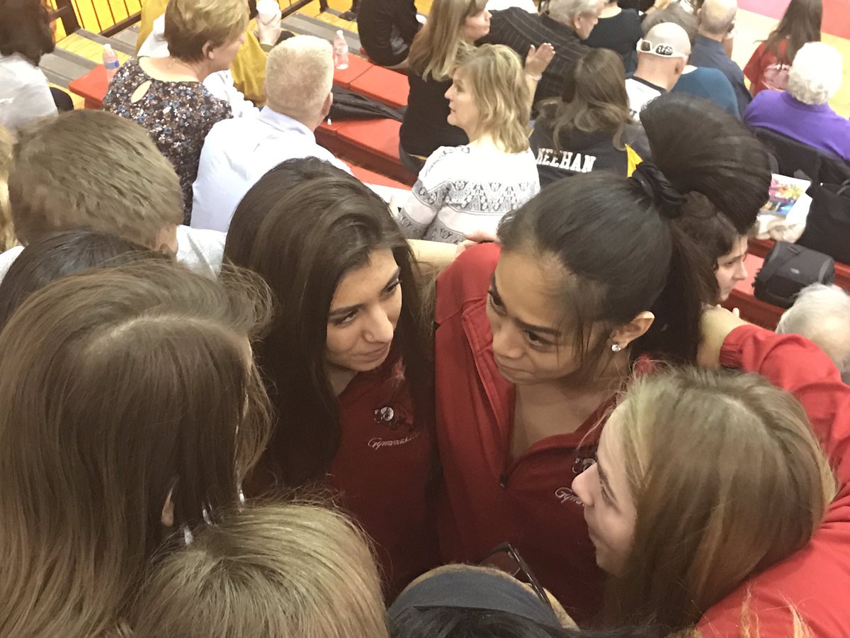 Veronika Srey gets one more group hug and team breakdown before the March-in...#GERams