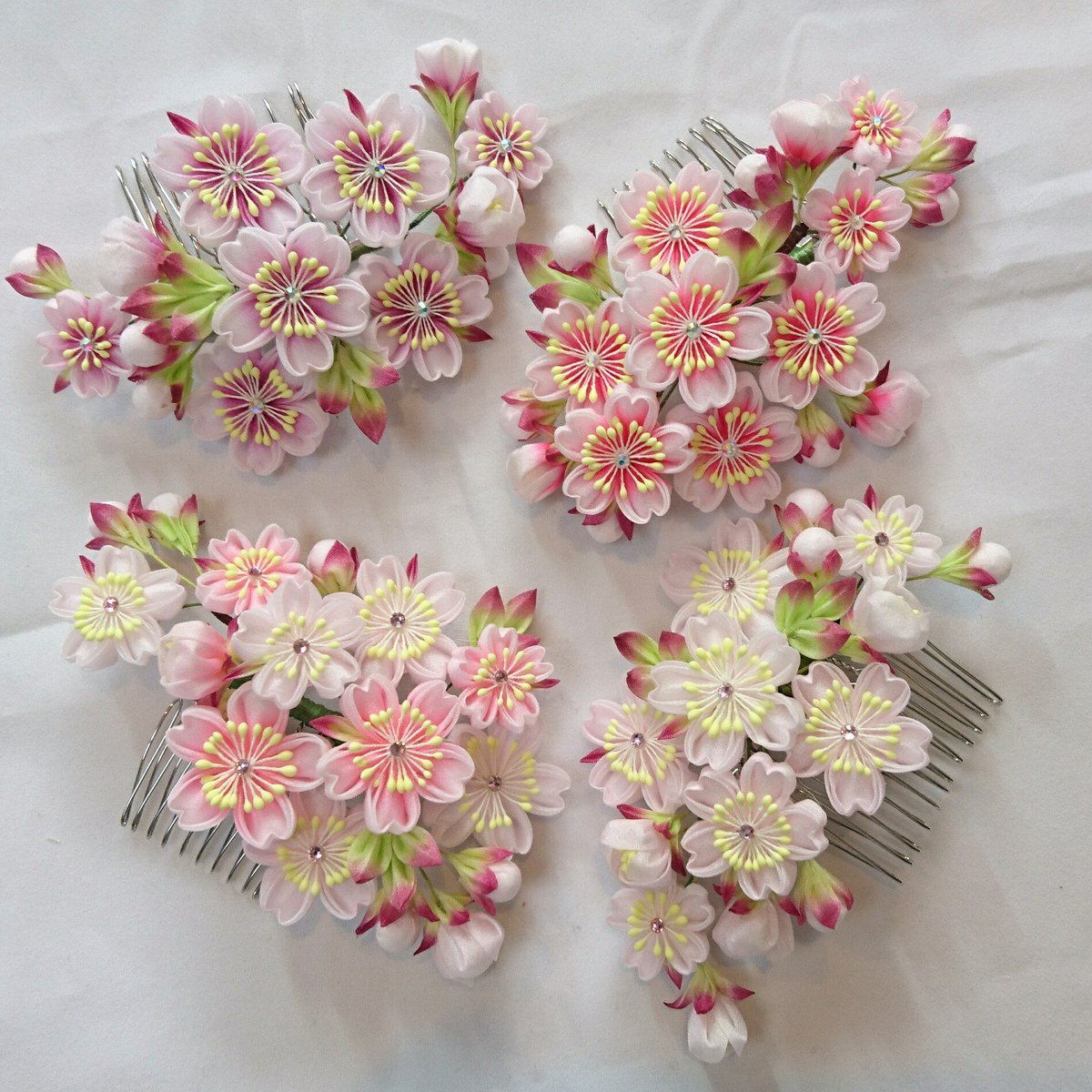 先日の桜組み上げました🌸同じ花数だけど半月と先細状にしてみた。11