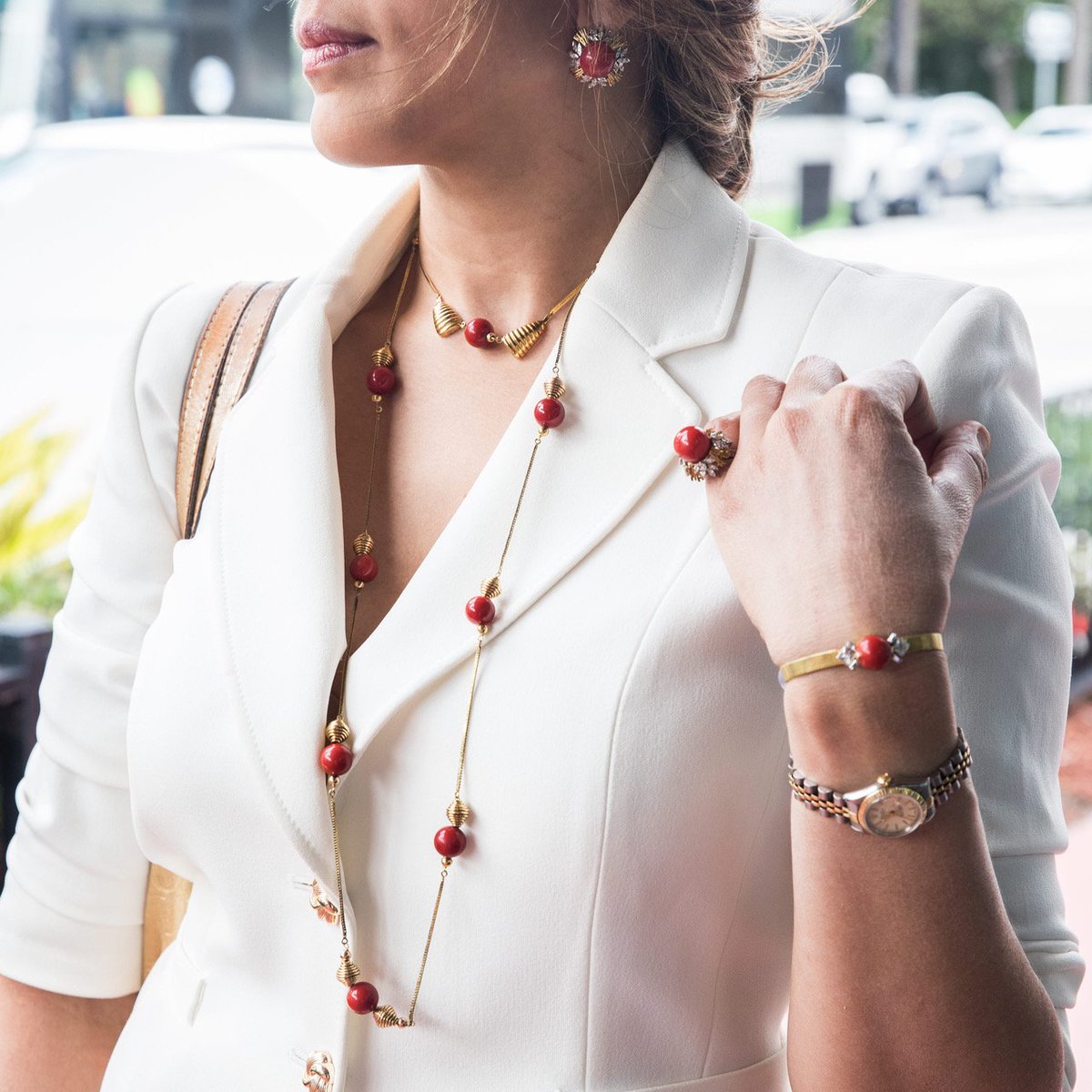 GrayAndSons's tweet photo. We love our customers! Brenda from Panama is modeling this 18k-gold-and-orange-fire coral jewelry set + #Rolex #jewelry #watch #grayandsons https://t.co/N3HytacxmB