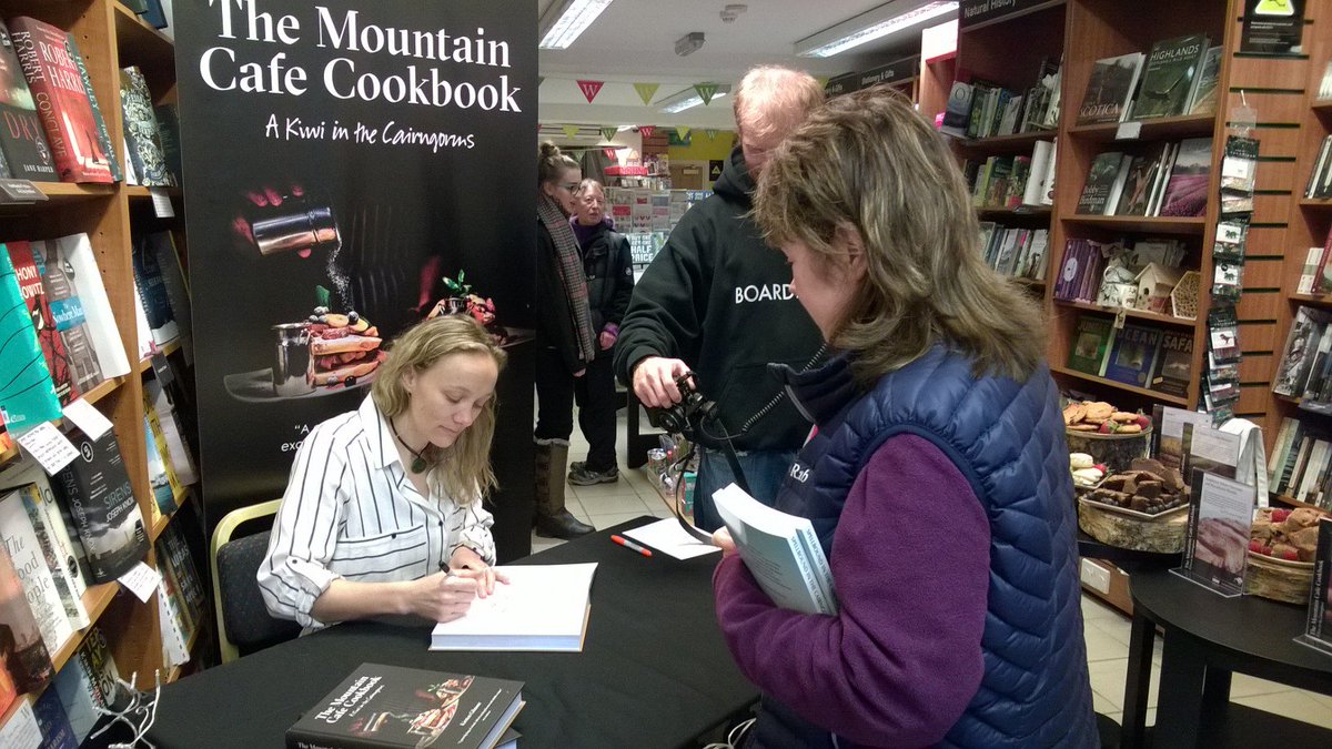WatAviemore's tweet photo. Books are flying out, cake is going down! Cheering up a dreich morning in Aviemore! #scotspirit #nzspirit! @mountaincafe https://t.co/bbxsA4tqaS