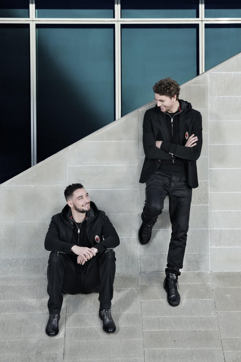 DIESEL's tweet photo. The power of look and feel good puts a smile on our faces. The #ACMilan Un/Formal Uniform by #Diesel #StylePartners #JoggJeans @acmilan https://t.co/xRzBx9TX6H