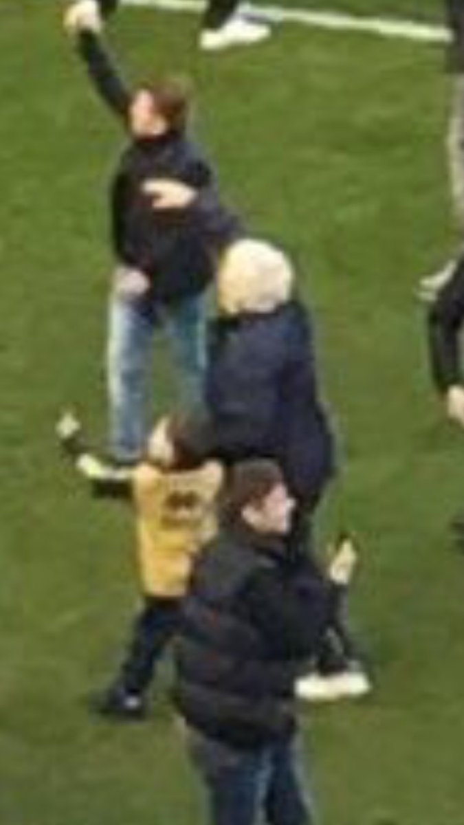 ForestLogic's tweet photo. Best thing about the millwall pitch invasion is the grandma and grandson mugging off the Leicester fans. https://t.co/qdBCzmihX8