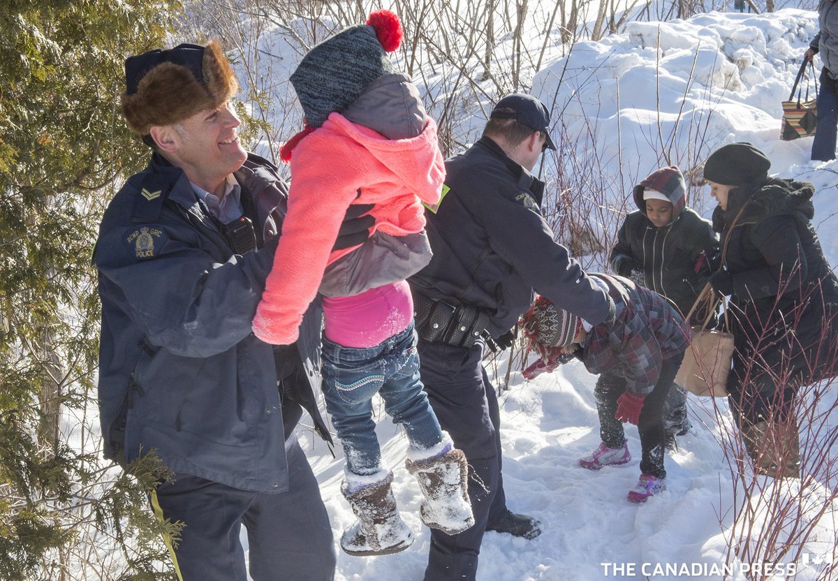 CdnPressNews's tweet image. Our viral photo shows Canadian Mounties meeting refugees at the U.S. border. ⚡️ Some comments from around the world: