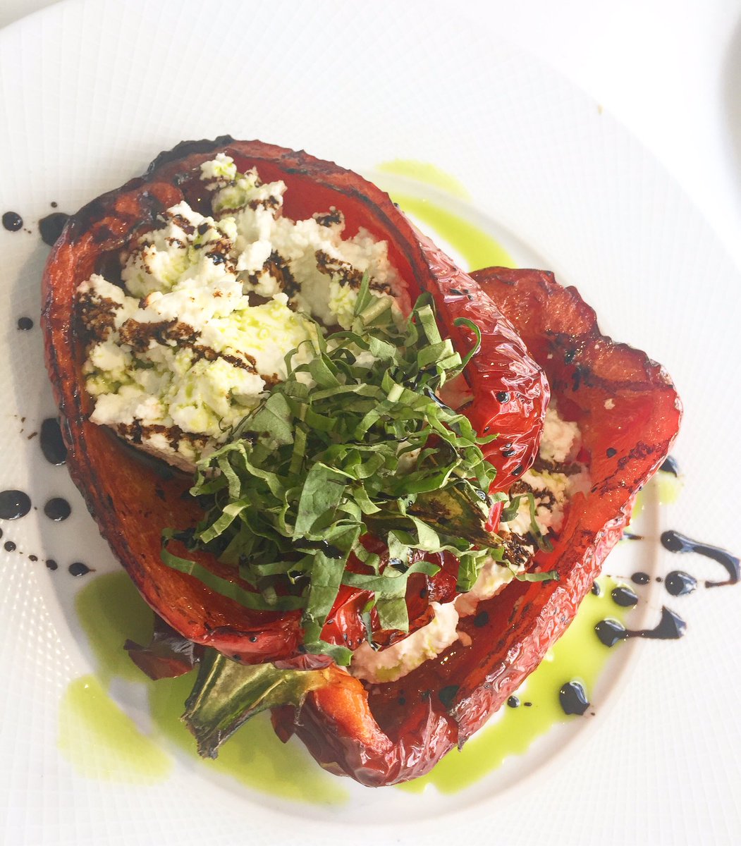 Outdoor #lunch of roasted red pepper w/feta at the new Santorini @HiltonBentley in #southbeach #miami #peppers