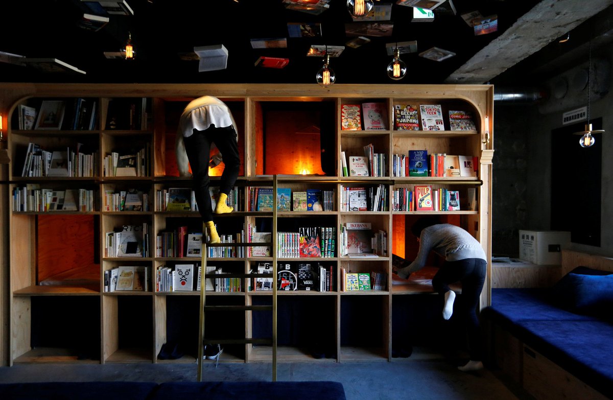 PDChina's tweet photo. Traveling bookworm’s heaven: bookstore-themed capsule hotels in Japan have beds constructed inside bookcases to doze you off while reading https://t.co/8u67Y0F3K7