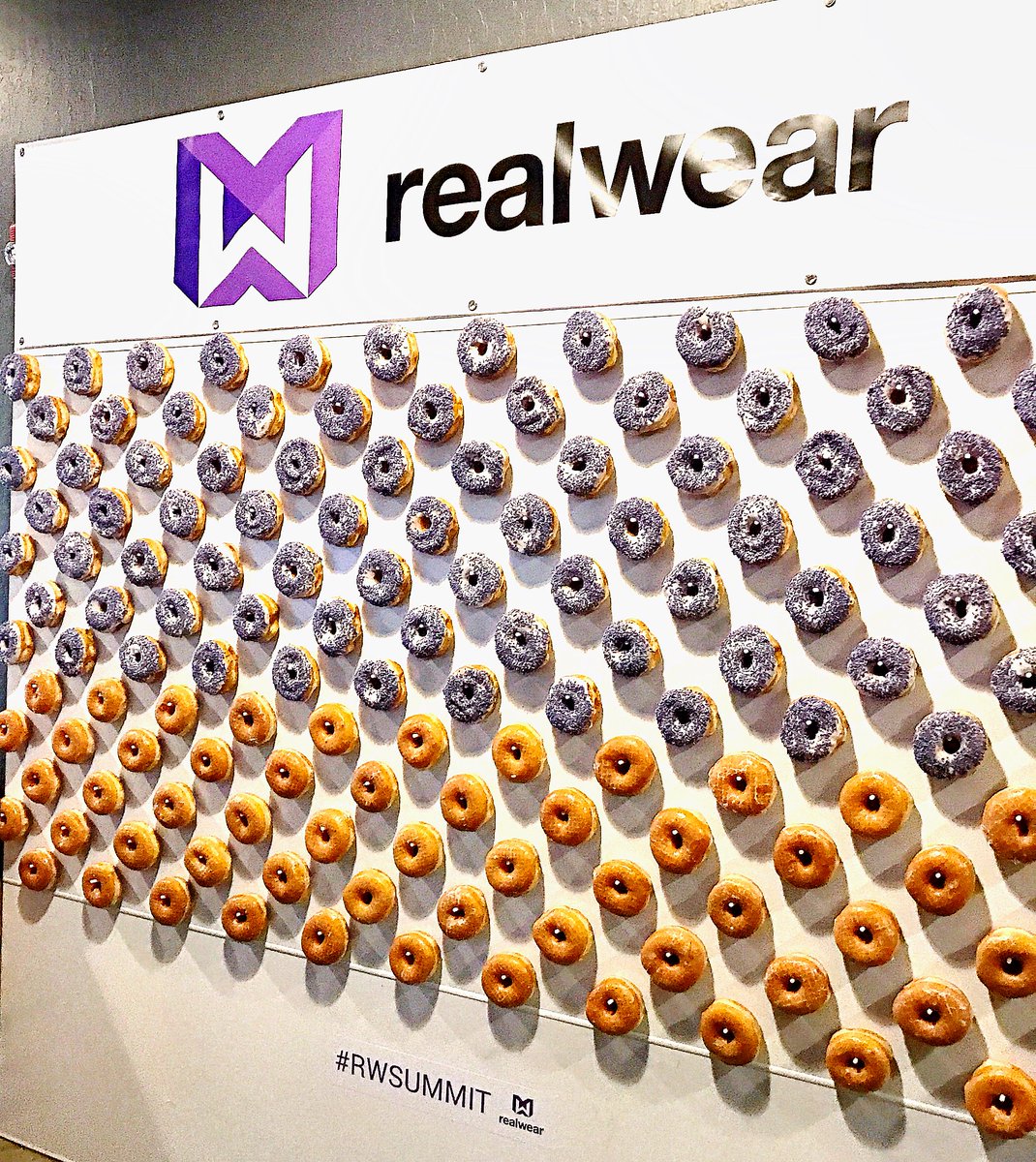 realwearinc's tweet photo. From doing the #industrialdesign for the HMT-1, to building a delicious #donutwall for #RWSummit, there's nothing Stephen Pombo can't do! https://t.co/RGnyb4tQwt