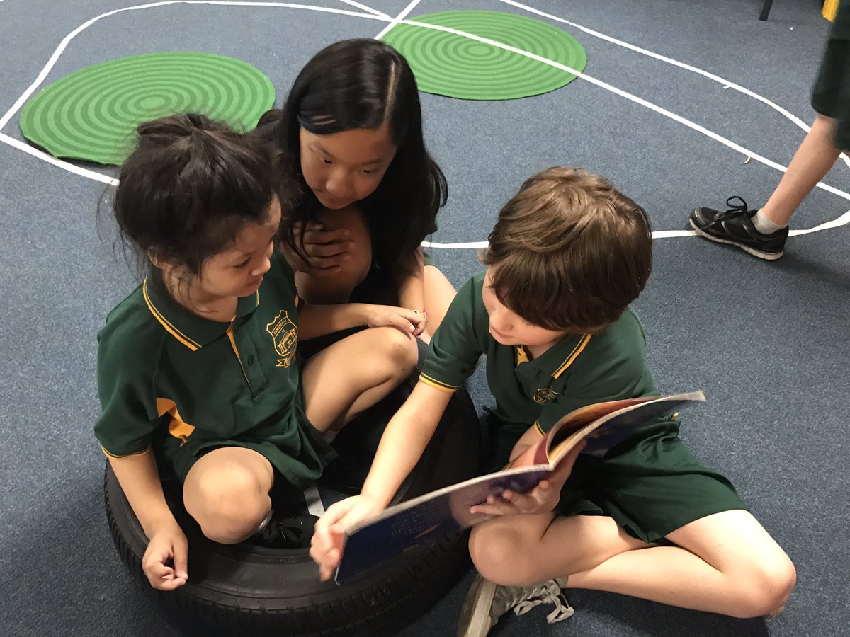 Ms_Shoveller's tweet image. Today we helped @RosellasCPS to use seesaw and read them some zoo stories. #buddyclass