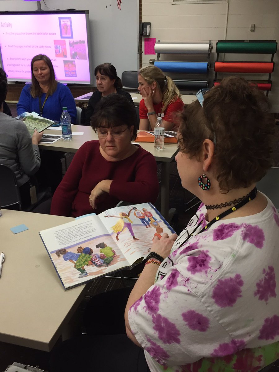 SherryHashman's tweet photo. Parkside Ts displaying cultural competence as they select books to celebrate the many cultures of their Ss #bcscudl https://t.co/6F6lDuWPcg