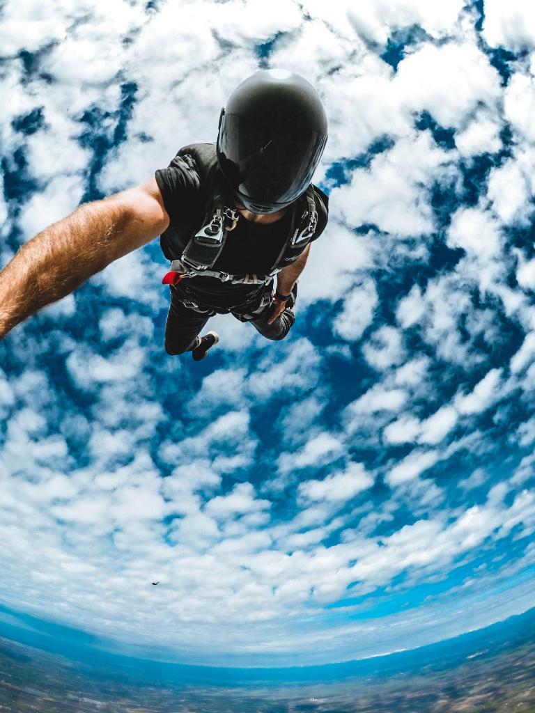 GoPro's tweet photo. Photo of the day! @moliverallen  flies towards earth at 180mph while playing tag with his buddies in mid-air. #GoPro #YoureIt https://t.co/ZoUtFJvbJl
