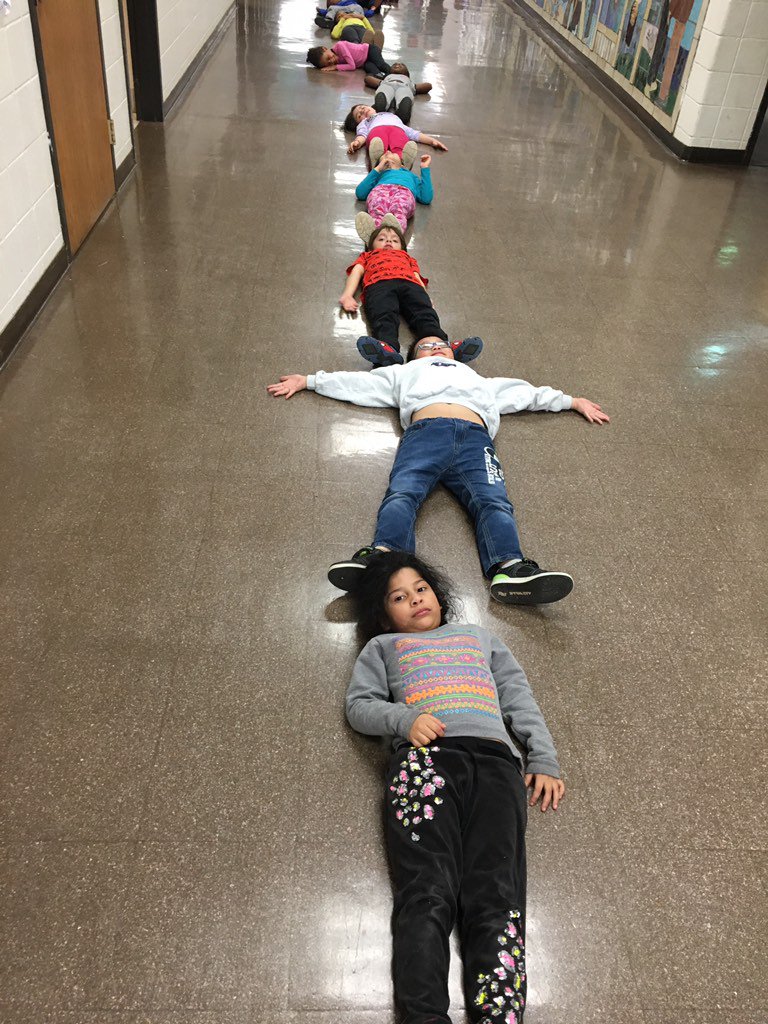 Grade 1 students lining up to celebrate 100 days of school
