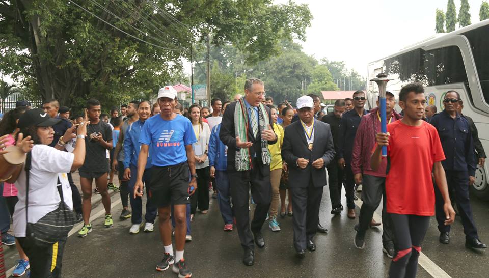 PMofTL6and7arch's tweet photo. #TimorLeste PM participates in 2nd #PeaceRunSriChinmoy (07-09/02). Pres. National Parliament &amp; PM receive #peaceaward. PM lights #peacetorch https://t.co/IroNy7ou4E