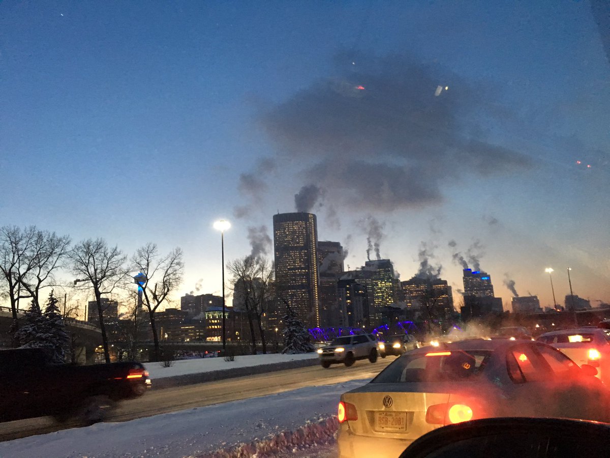 NeilEnock's tweet photo. Ever wonder what happens to all the plumes off the buildings downtown at 30 below? Sometimes - nothing! #coldCalgary https://t.co/dEfsljy1bb