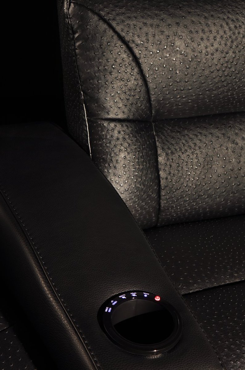 Cooling Cupholder with Controlling Activation.  Neatly designed to control the recline function of our Sedi Range.