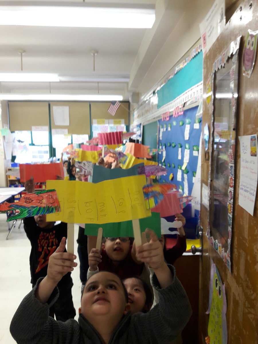 K-106 parades with their dragons after learning about Chinese New Year! Gung Hat Fat Choy!