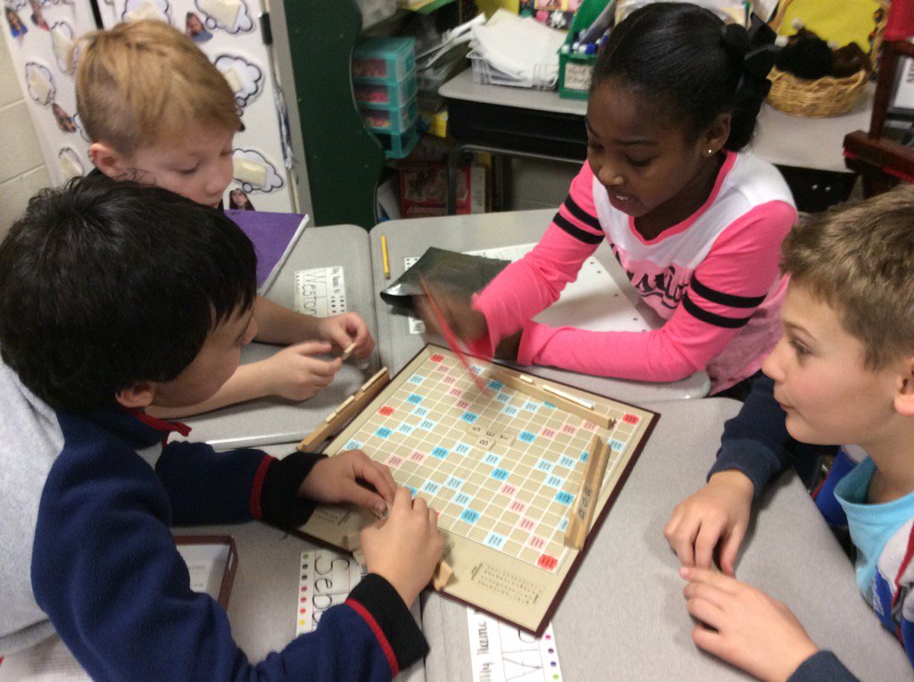 Stewart's class studying game boards and directions.