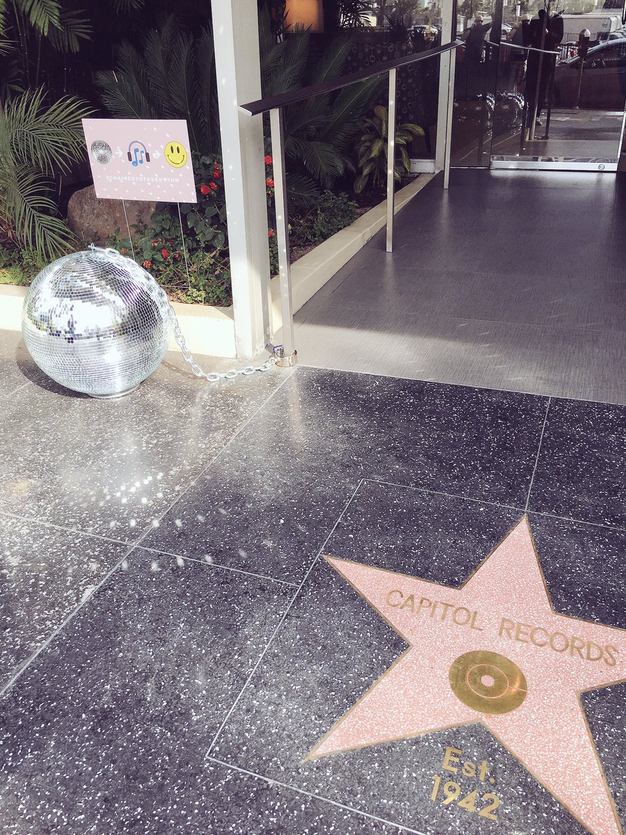 capitolmusic's tweet photo. SURPRISE LOS ANGELES! Another @katyperry disco ball has dropped outside of our building! #CHAINEDTOTHERHYTHM #KatyCats https://t.co/jrIXzPZTNc