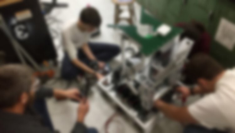 Robodox's tweet photo. Now we know gravity works because everyone is sitting on the floor to work on the #ruby2017! #omgrobots #firststeamworks https://t.co/2AXmex9y7p