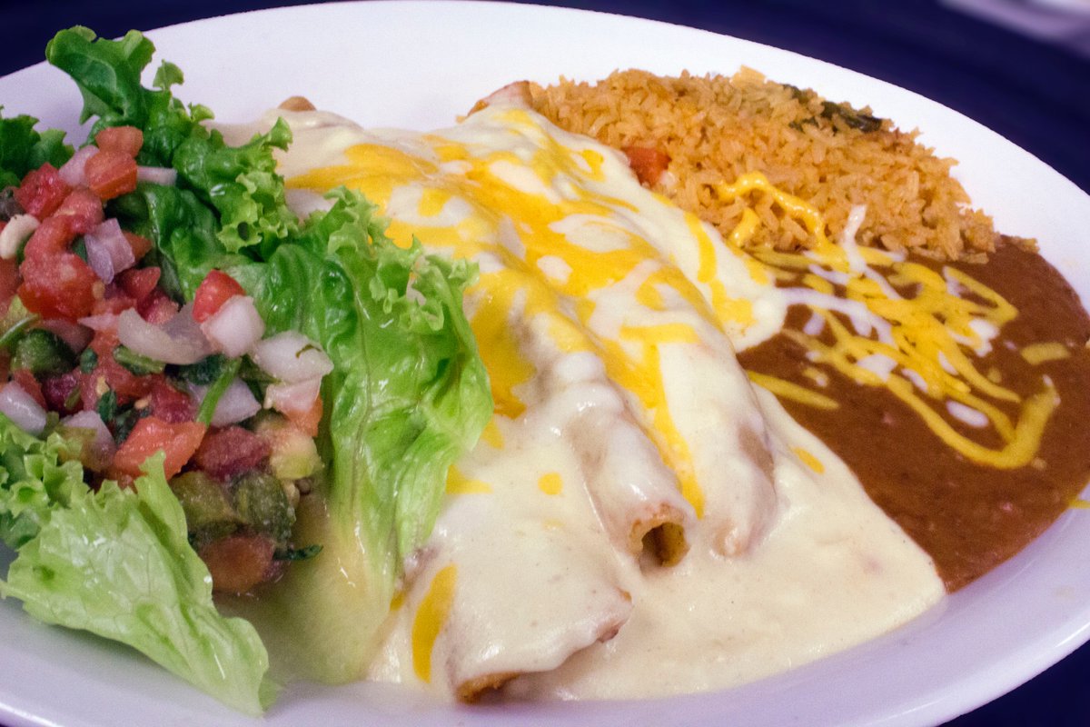 CampuzanoMex's tweet photo. Enchiladas with Rice and Beans #itsallgoodbaby #sourcreamsauce https://t.co/Ohb5FUo9eZ