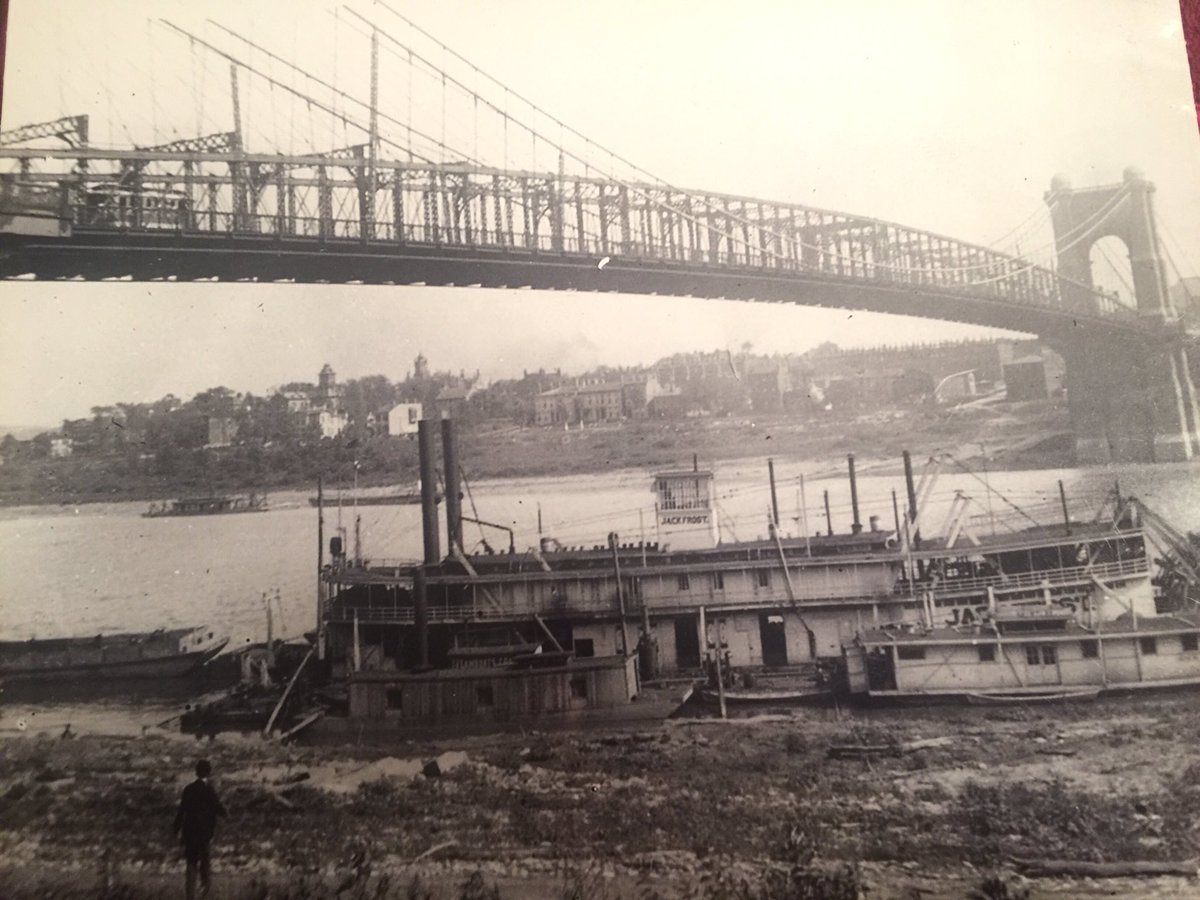 Dodger7686's tweet photo. @CincyStreetcar @CB_Connector A streetcar (top left)moves across the suspension bridge over 100 years ago. Will it happen again? https://t.co/B8OKNhnNEV