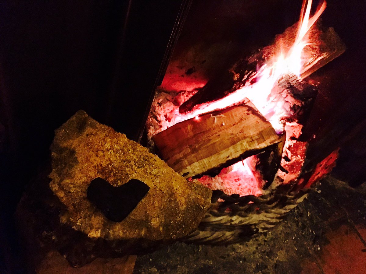 SarahCityLife's tweet photo. The fire @TheAngelPub just spat out a love heart chunk of coal at me. Then burnt a hole in my dress. I forgive it. #alwayslove #pubfires https://t.co/bzDk7loWo7