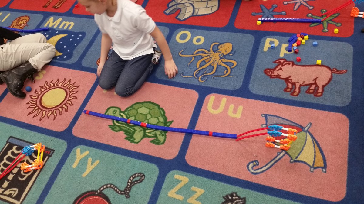 MrsLousClass's tweet photo. Using our ramps and measuring how far out ball rolled with cubes as our tool! #science #pushpullgo #kindergartenrocks @baltzprincipal https://t.co/qy92dGjwnG