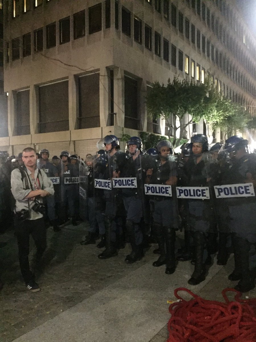 ewnreporter's tweet photo. #SONA2017 Riot police blocking journalists from moving up to Poorthuis, the exit point from the National Assembly. LD https://t.co/104ETPpmQZ