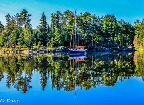 Congrats to Dave Debney for the March issue Ed Choice photo of the Holms' C&amp;C 33. With his HDR photo, he won a T-shirt and all this glory!