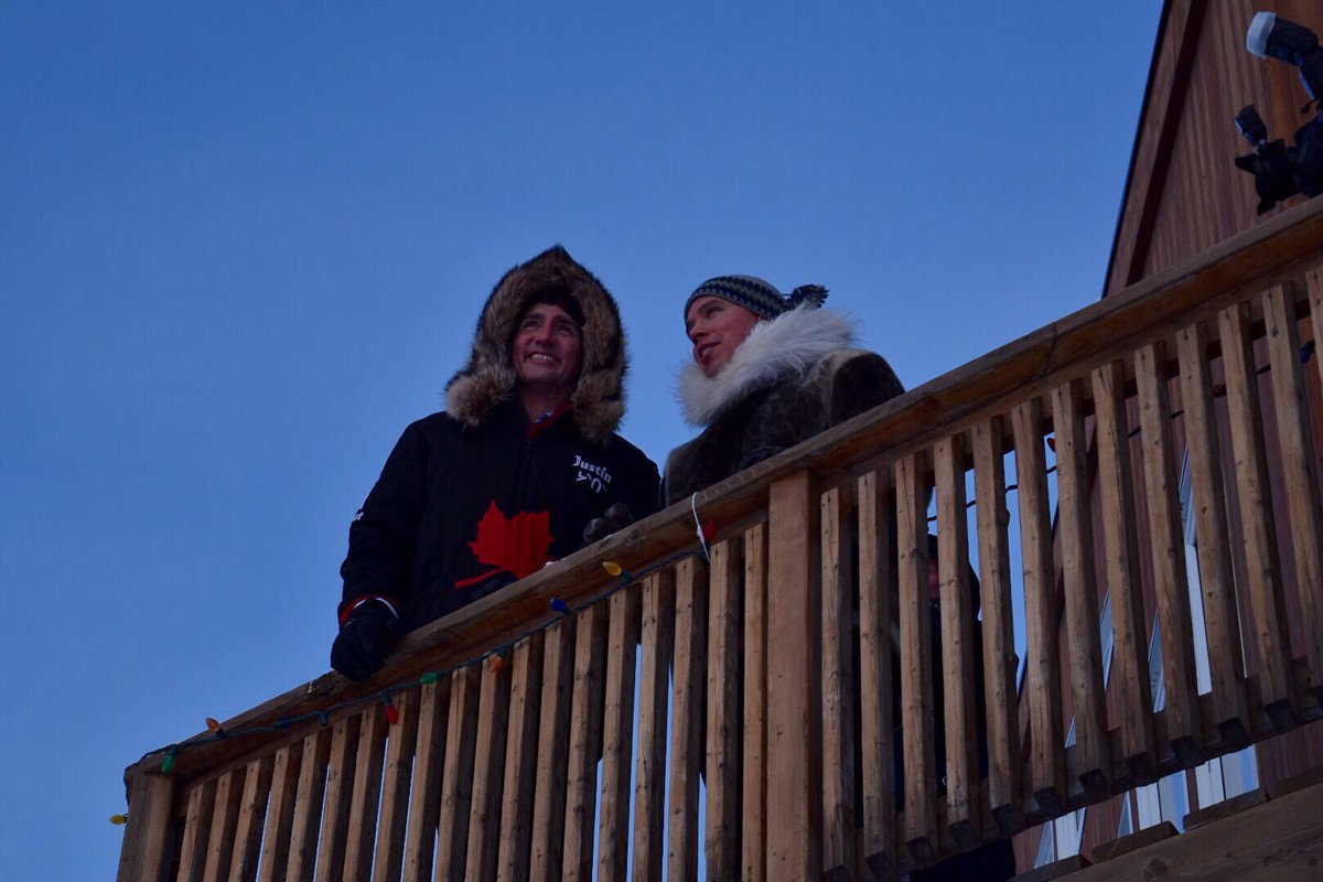 NickMurray91's tweet photo. The Prime Minister &amp; Inuit Tapiriit Kanatami president Natan Obed take a minute to enjoy the view off Obed's deck in Iqaluit. Weather: -40C https://t.co/XXdJ36EjCt