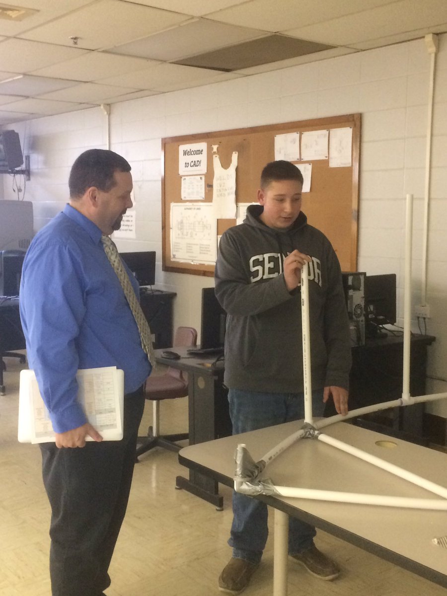 larry_garrity's tweet photo. WCATC Advanced CAD student explaining his #MSUEngineeringDay project to @BowlesGreg #1WC #CareerReadiness #CTEmonth https://t.co/lKl7OxfWkM