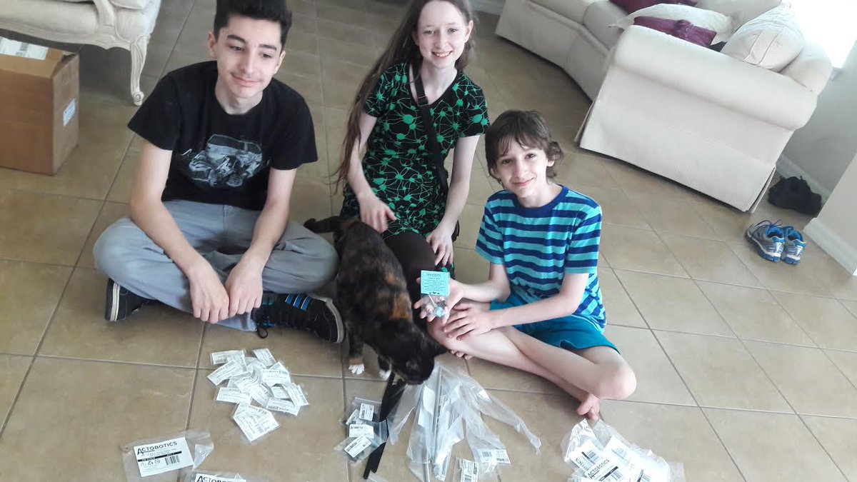 Team5937's tweet photo. Zoe the Cat wanted in the picture w Jeremiah, Rhiannon & Frankie #Servocitycandy #actobotics #Servocity https://t.co/OaCOheMqup