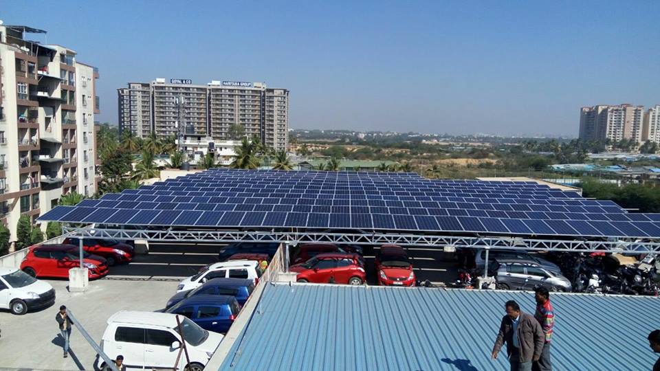 The 125 kW solar rooftop system on elevated super structure installed at Pratham Motors. #ConserveourEnergy #PreserveourWorld.