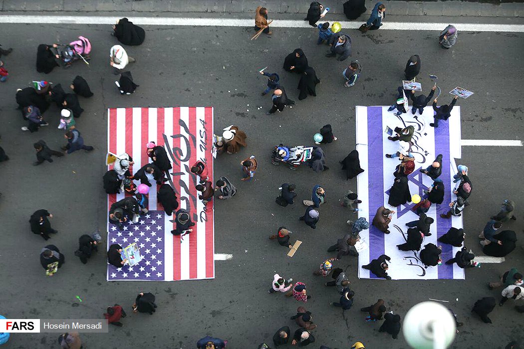 juhhhjgghk's tweet photo. Hundreds of thousands of Iranians protest by chanting "death to America" while trampling our flag. Why would we invite this to America? https://t.co/sd9sb3GUq9