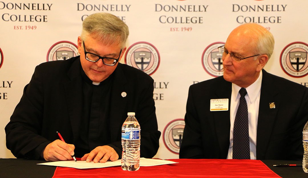 DonnellyCollege's tweet photo. Today, @MsgrSwetland, president of Donnelly College, &amp; Dr. Ken Weaver, dean of @TTC_ESU, signed a 2+2 transfer agreement. #TeacherEducation https://t.co/pYXxtIEcEm