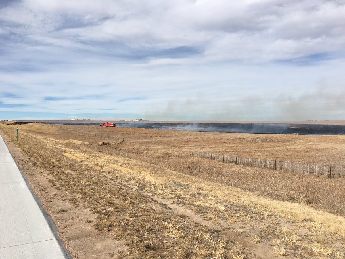 Grass fire east of Seibert on I 70. Fire crews on scene now. #fire #dry conditions #redflag