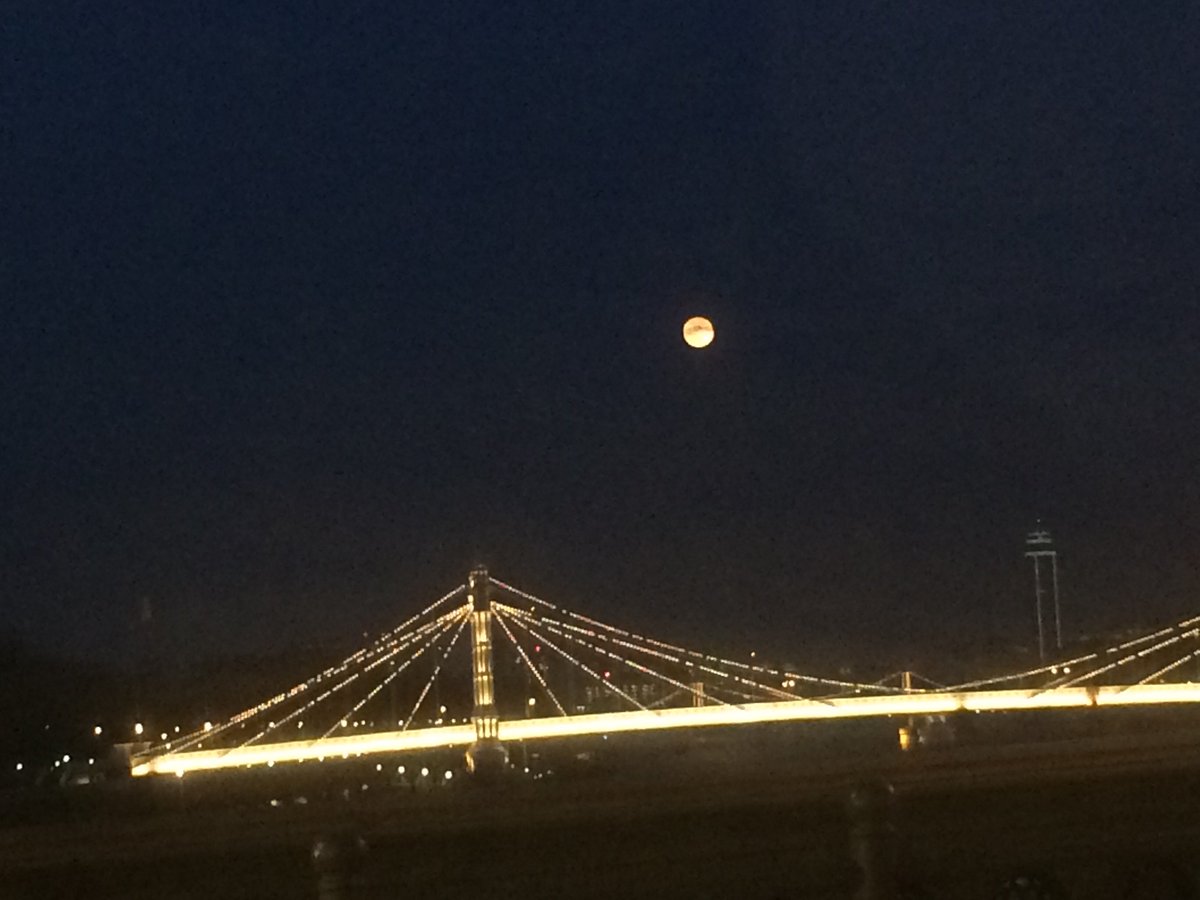 Kochtales's tweet photo. Wonky picture of Albert bridge and full moon. Off to see v dear friend, Katherine, who I always think of when I see this Bridge https://t.co/GTprDnXW54