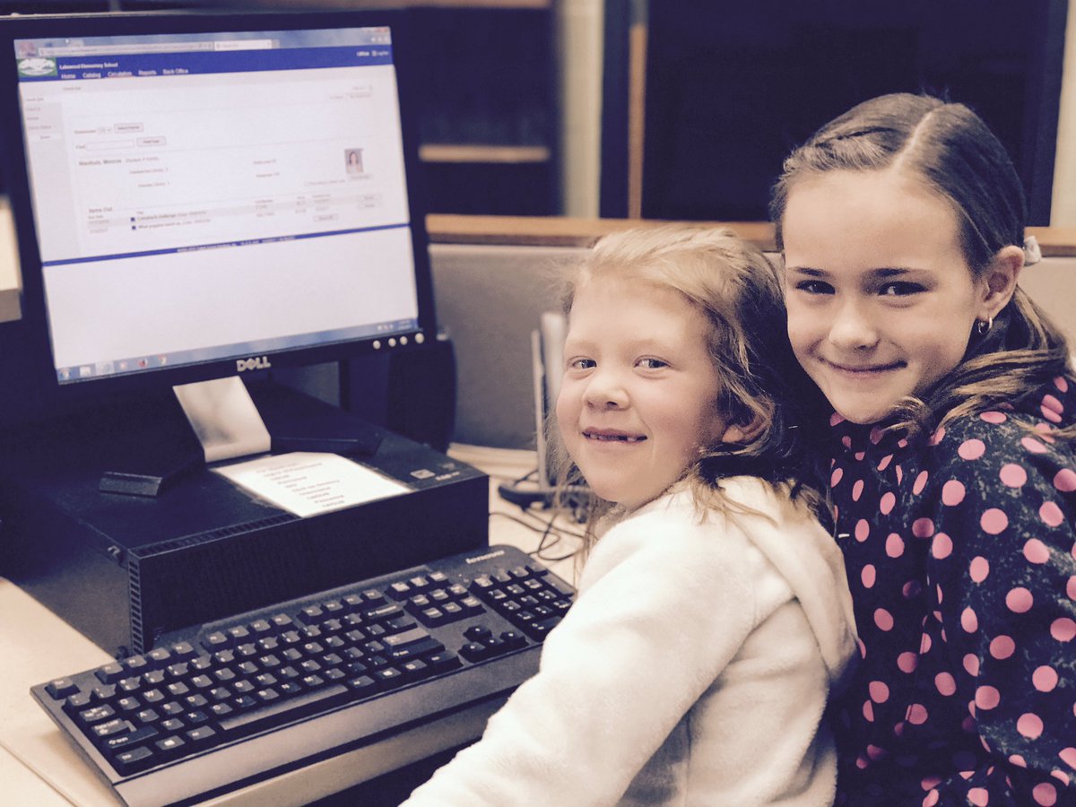 Meet our student librarian, Miss Pearson, and her assistant, Ms. Nienhuis.  Thank you, ladies!  <a href="/LakewoodEl/">Lakewood Elementary</a>