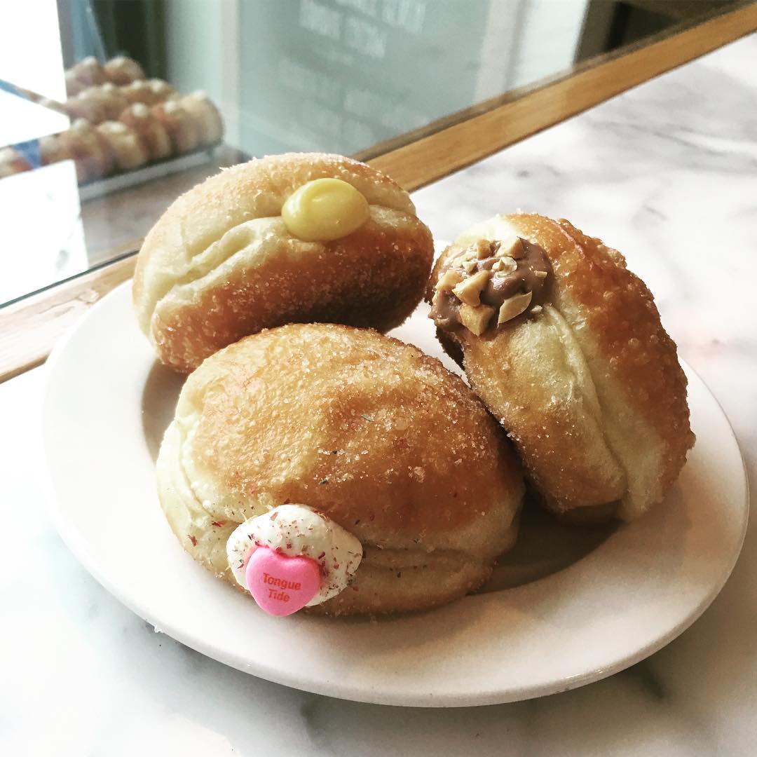 Valentine's Day flavors: white chocolate rose, peanut butter cup, and passion fruit curd. Available Sun through Tue! instagram.com/p/BQWMuuhFW9w/
