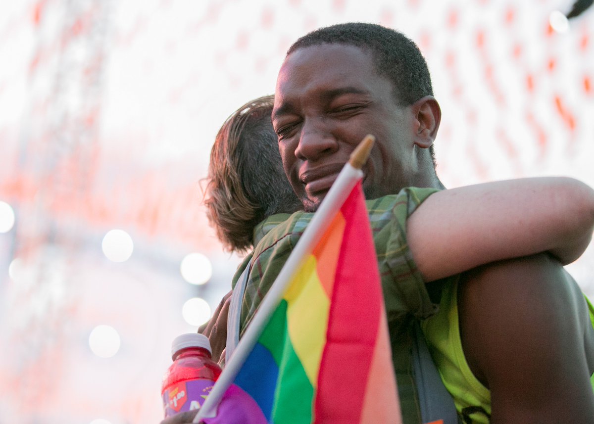 NYCPride's tweet photo. A touching embrace captured at the #Rally2016. https://t.co/wXnAG899tC