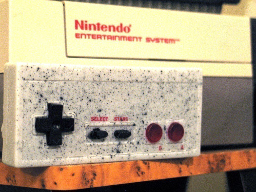 nintencollect's tweet image. Today's #DailyGameEats: This #NES-controller shaped candy bar (ok, maybe it's a bar of soap, but it looks enough like candy to make it here)