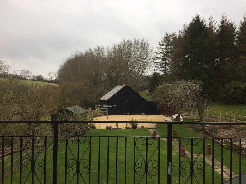 TeaganTheDog's tweet photo. We got snow! @tylersat99 on the garage roof- can you see it? #NotEnoughSnow Oh well, maybe welll get more later! https://t.co/Is2P1bmDmw