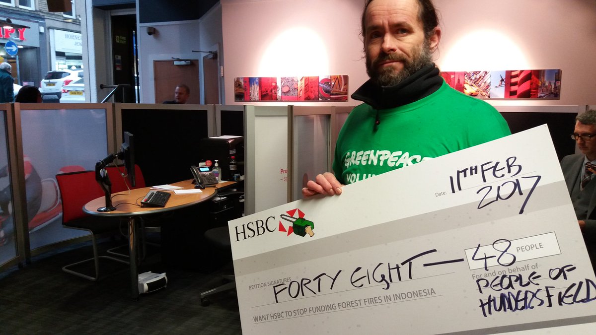 HuddsGreenpeace's tweet photo. Waiting to see the @HSBC_UK manager to hand in our novelty cheque... #HSBCexposed for funding dodgy palm oil @GreenpeaceUK @yorkshirepost https://t.co/iUTHw7sEch