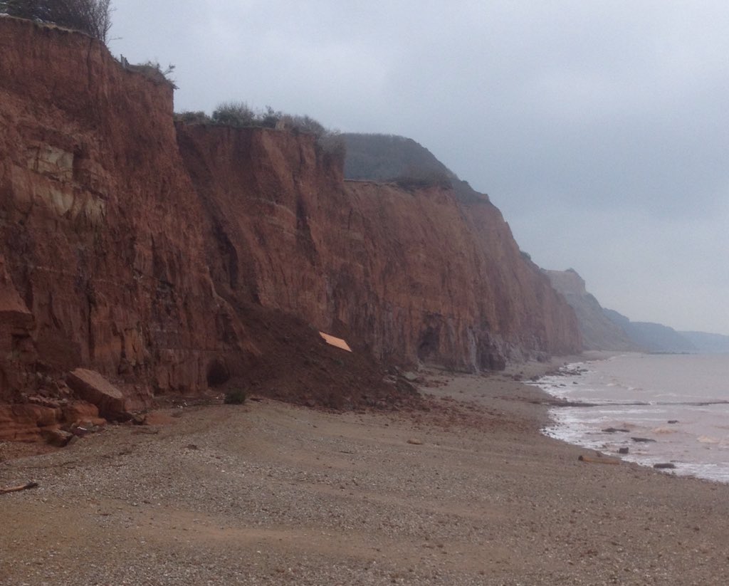 Wildlife247's tweet photo. Men in sheds? Let's hope not! Remains of some bloke's probable retreat down at bottom of Sidmouth cliff! #Sidmouth @EastDevonAONB #Erosion https://t.co/ZVYZvpxQt2